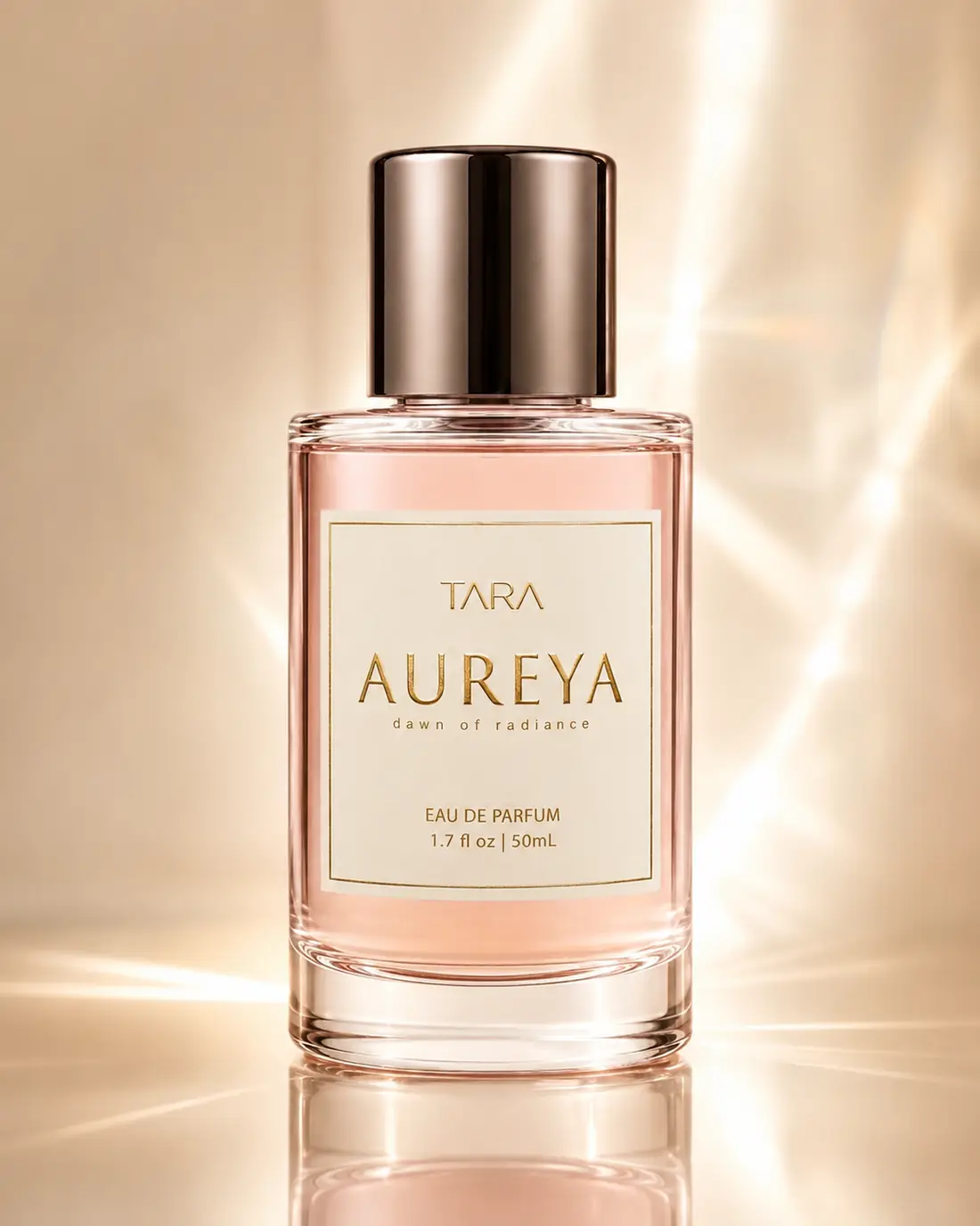 Aureya perfume bottle styled with blush florals for an early customer review.